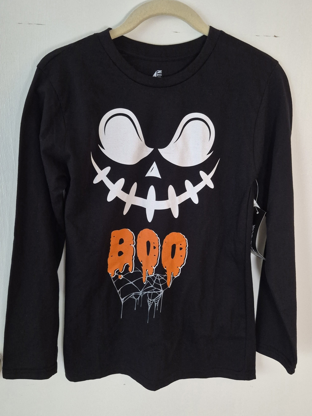 American Dream Black Long-Sleeve Tee with White Skull Face and Orange BOO